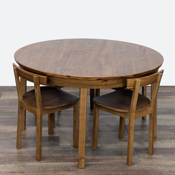 a wooden table with chairs and a table cloth 