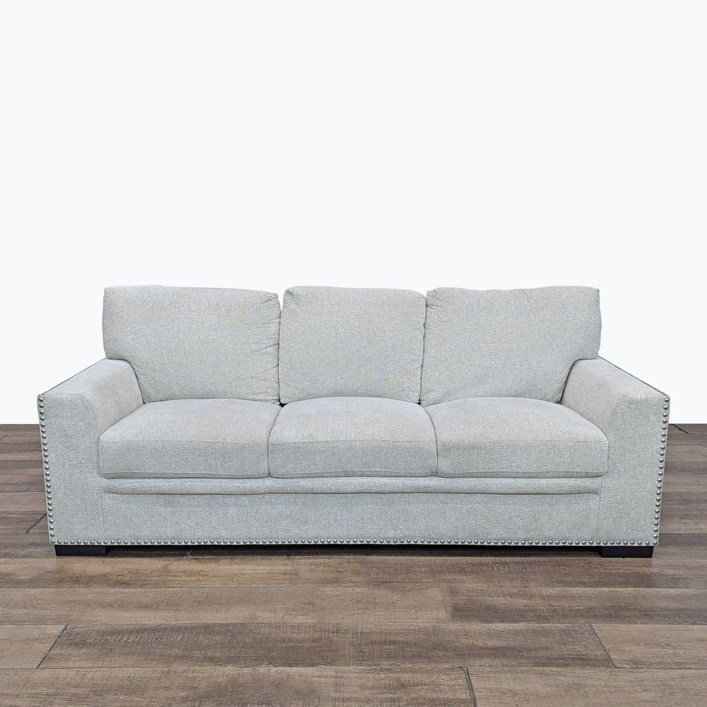 a couch with a white couch cushion on it 