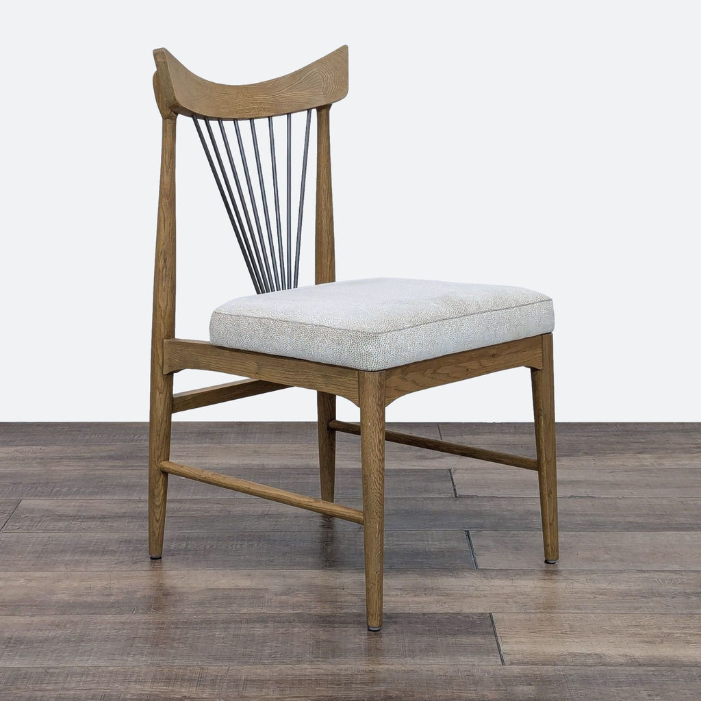 a wooden chair is sitting on a wooden floor 