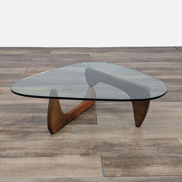 a table with a large glass table top on it 