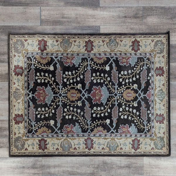 a large square patterned rug with a picture of a person 