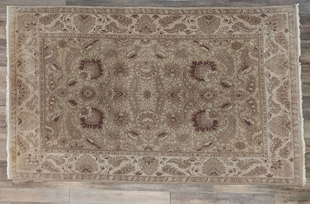 a large white rug with a pattern of dots on it 