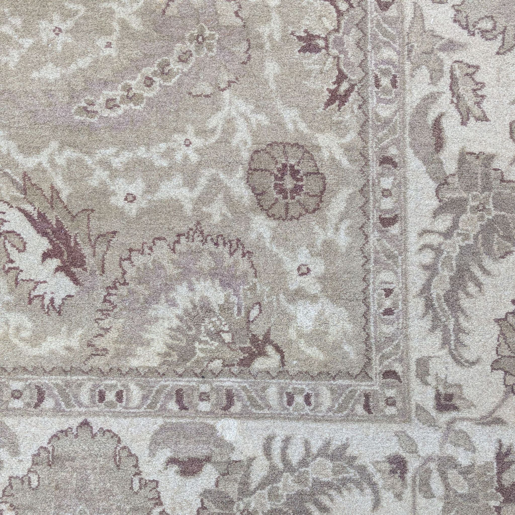 a large white rug with a pattern on it 