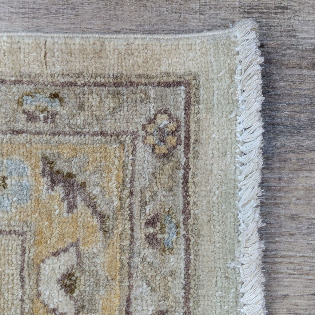 a wooden floor with a rug and a rug mat 