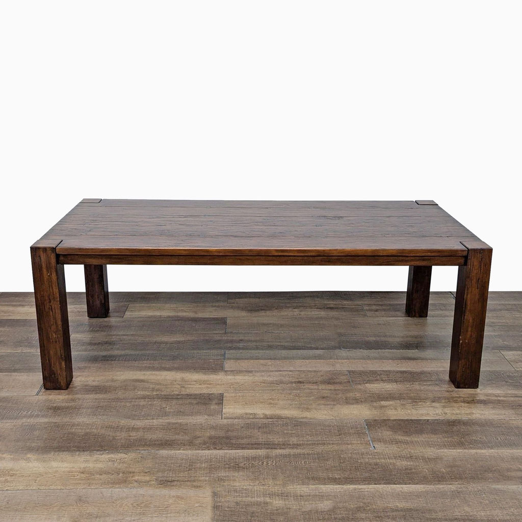 a wooden table with a wooden table cloth on it 