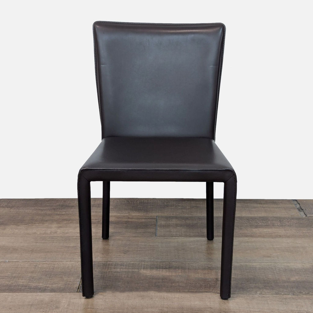 a black chair with a black seat and a black chair 