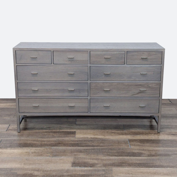 a wooden cabinet with a black and white striped dresser 