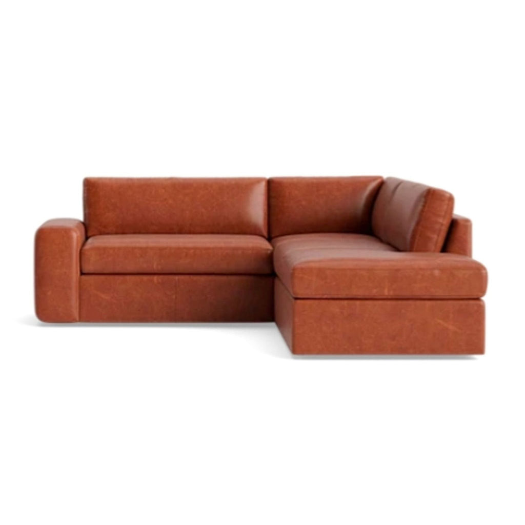 1. Front view of Benchmade Modern OG Couch Potato Sectional in Marfa Terra Leather, right bumper, rounded design.