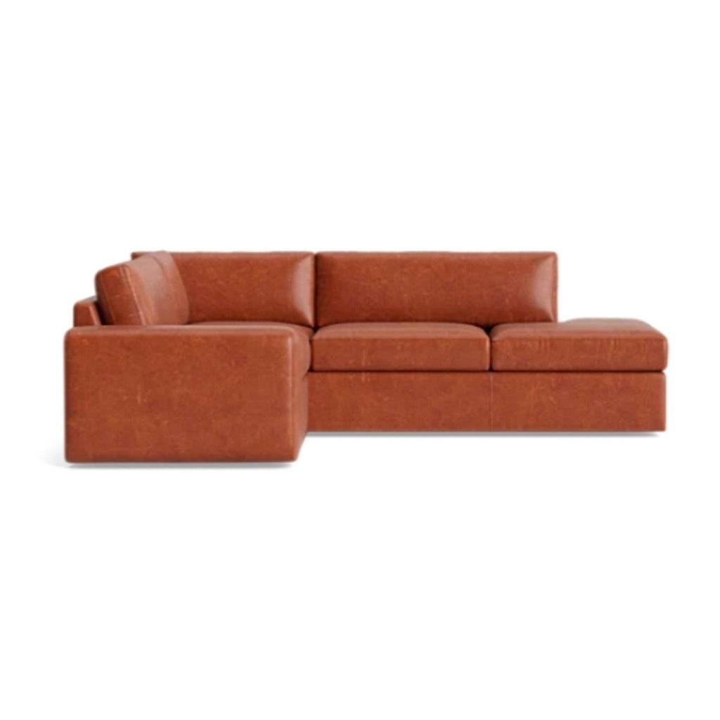 2. Side view of a contemporary low-profile OG Couch Potato sectional in brown leather by Benchmade Modern.