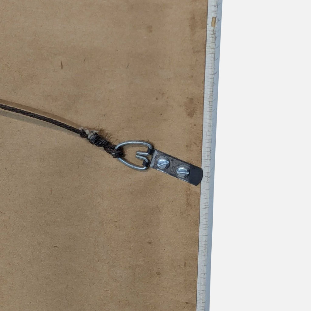 a pair of scissors is hanging from a wire 