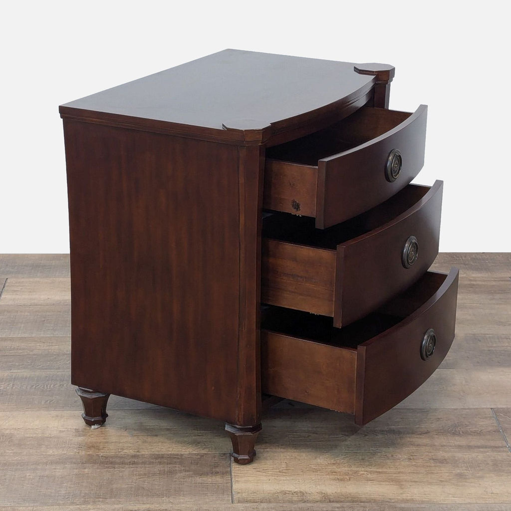 a wooden cabinet with a black and white striped tie 