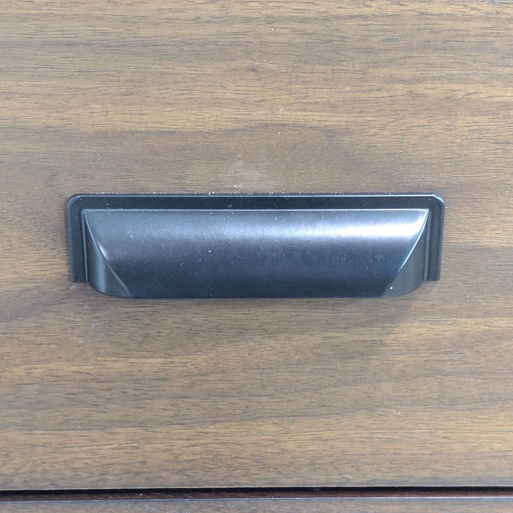 a black and white photo of a wooden table 