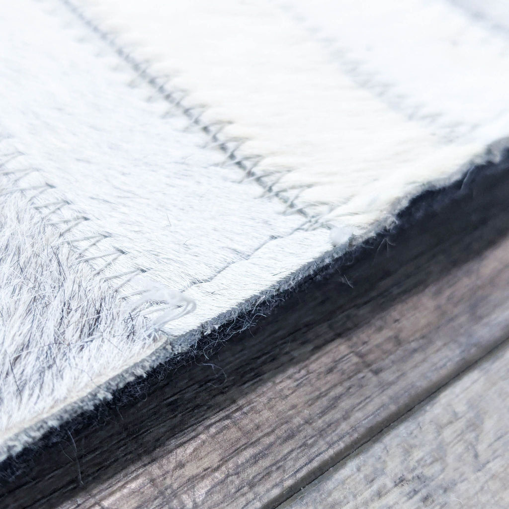 a book is laying on a wooden surface 