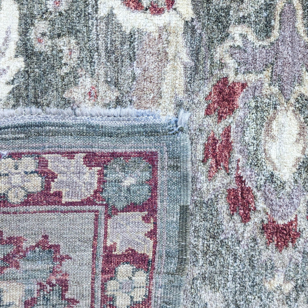 a painting of a person with a scarf on a rug 