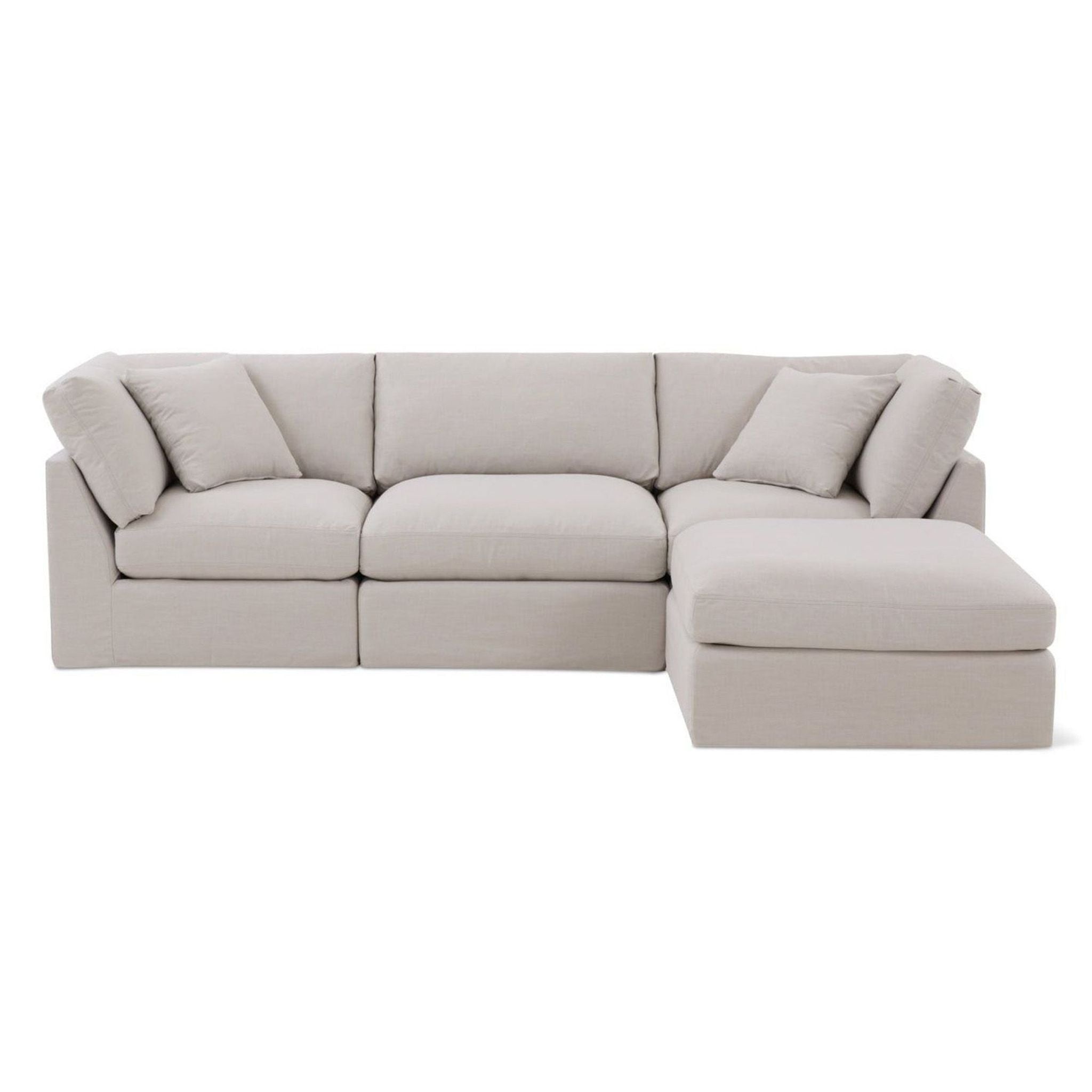 a white couch with a black couch cushion