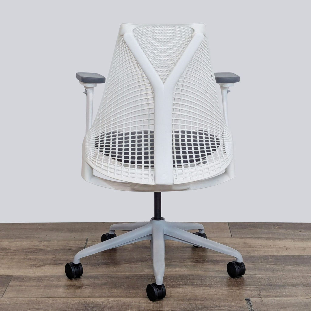 a chair with a metal frame on top of it 