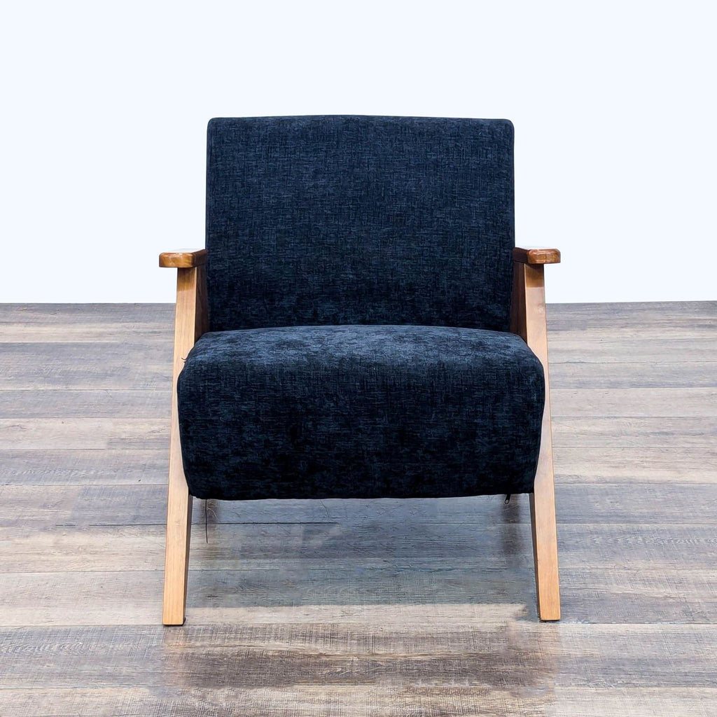 a chair is sitting on a wooden floor 
