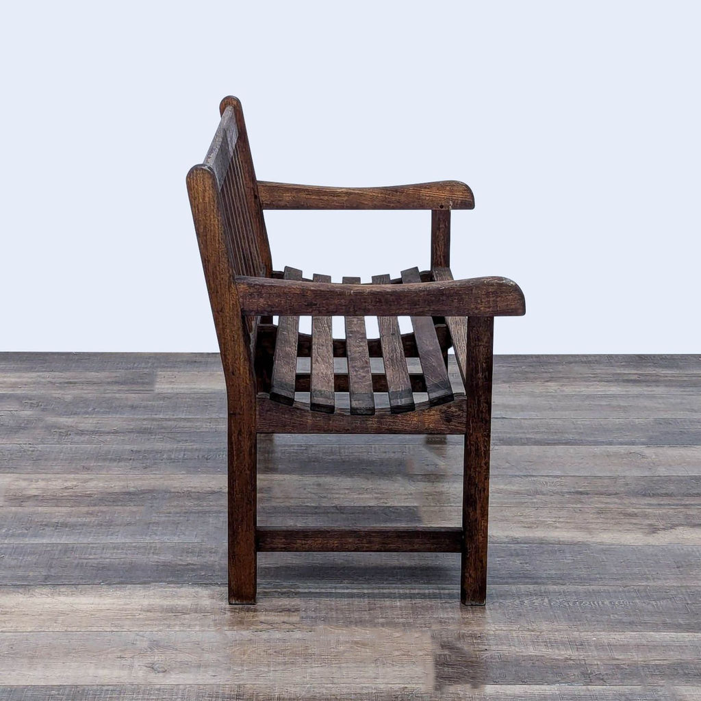 a wooden chair with a wooden seat on it 