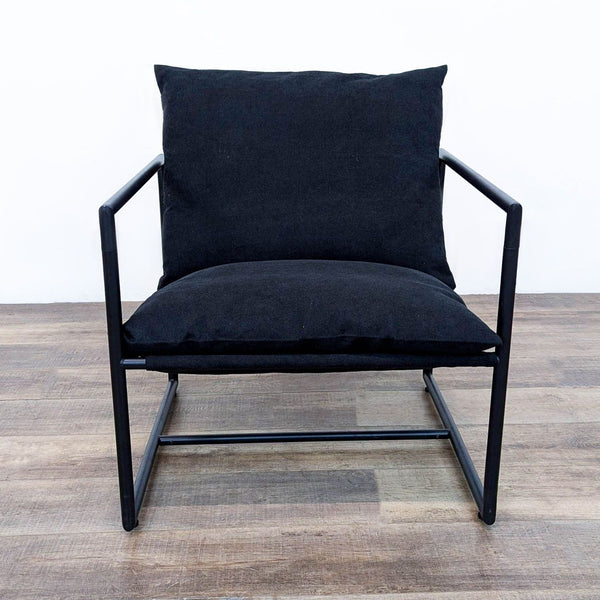 a black chair with a black leather seat 