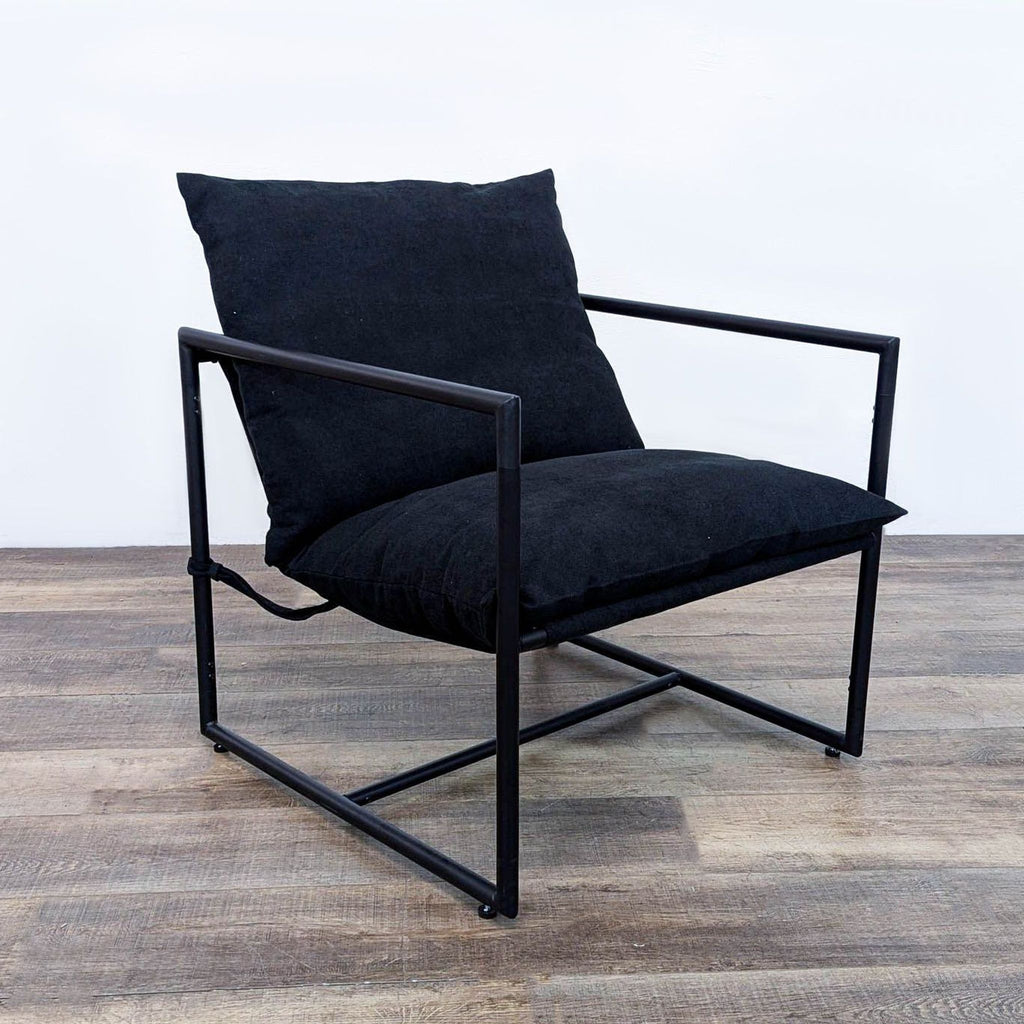 a black chair with a black leather seat 