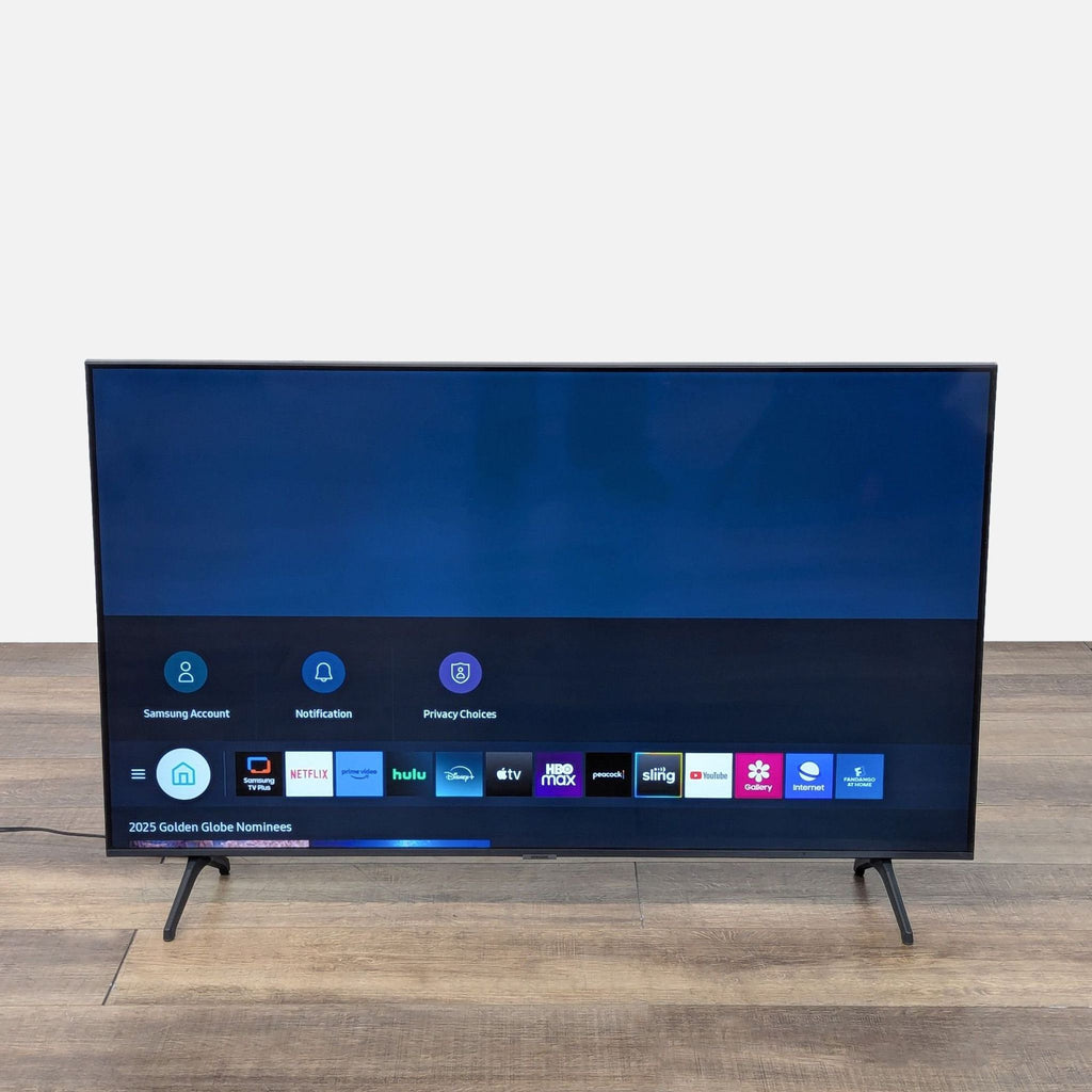 a computer screen on a table 