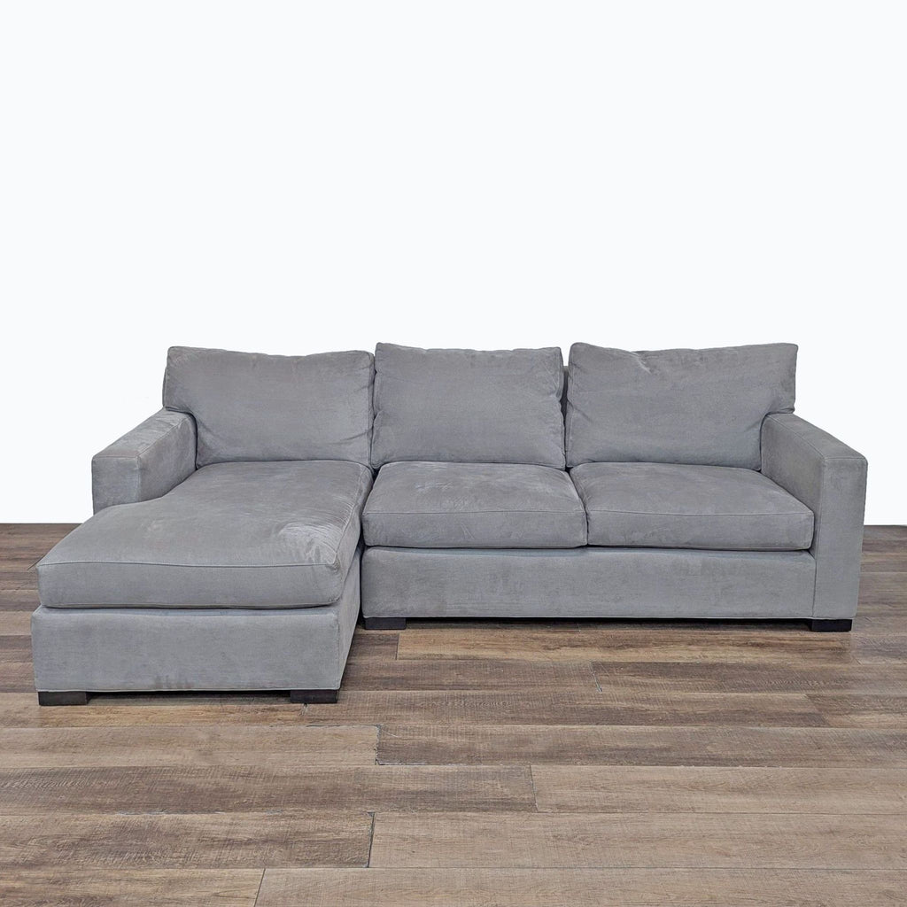 a couch with a black couch cushions and a black couch cushion 