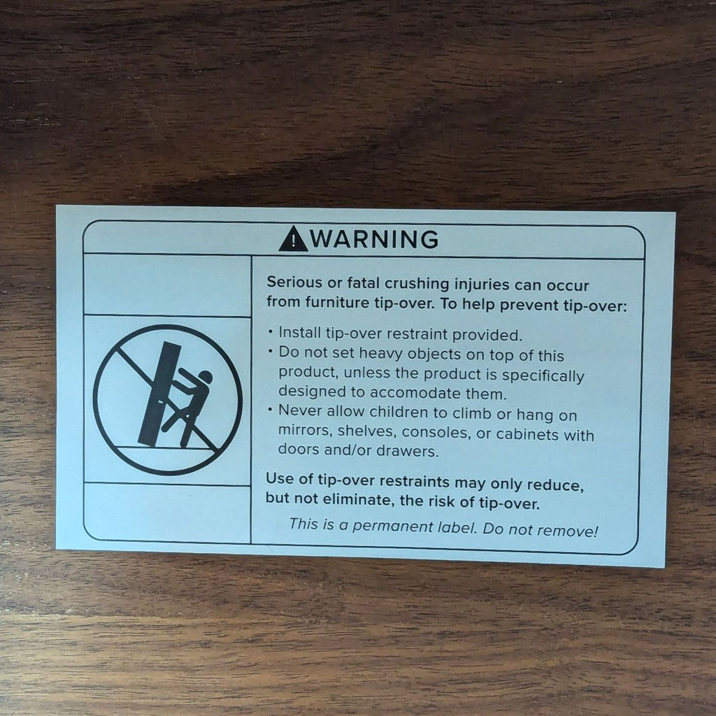 a sign on a wooden table 