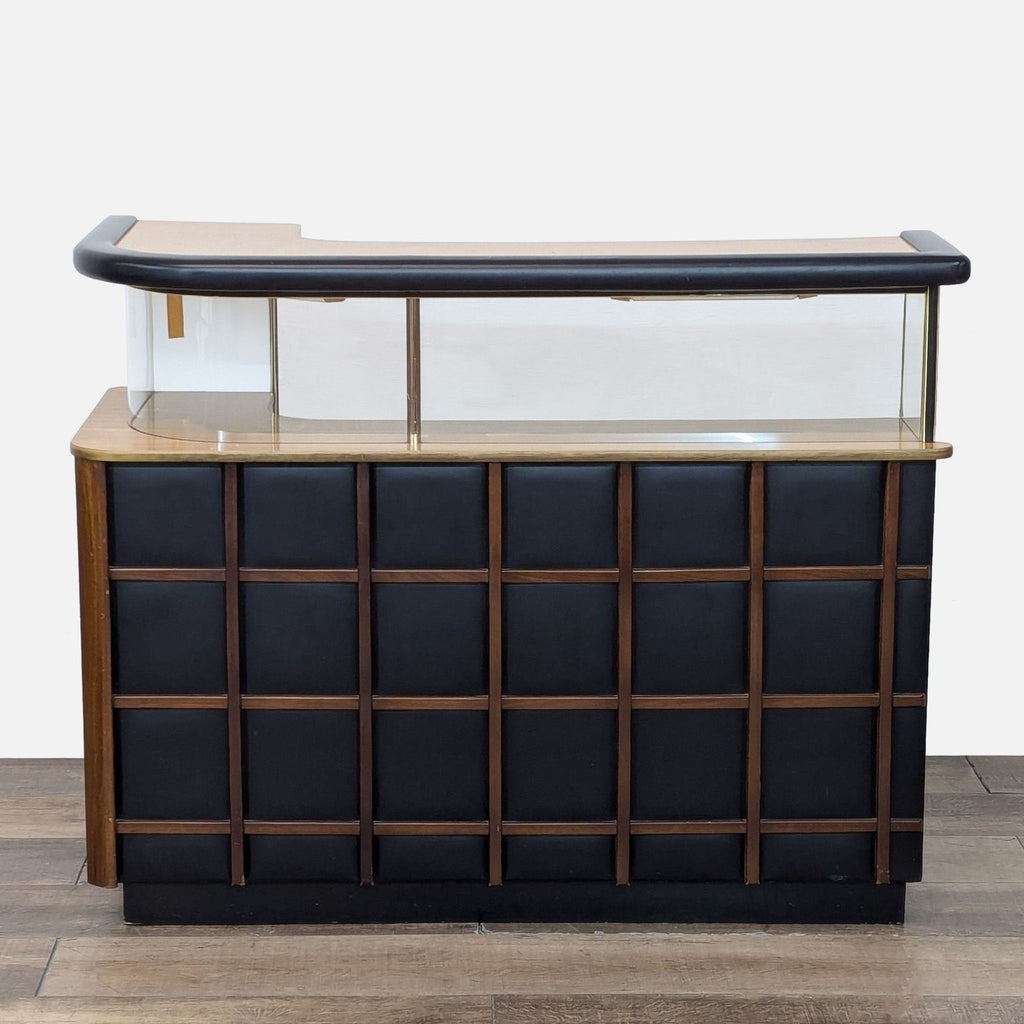 a wooden table with a vase on top of it 