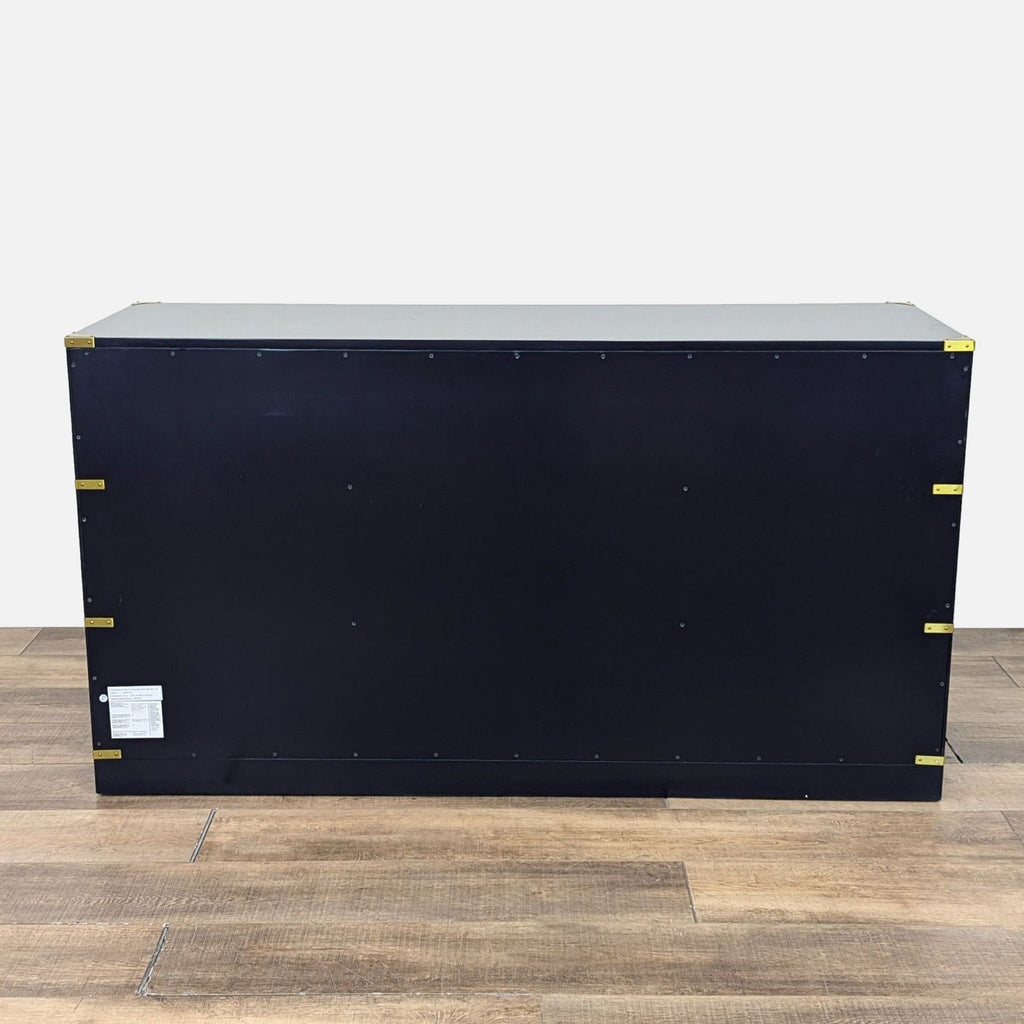 a piece of luggage sitting on top of a wooden floor 