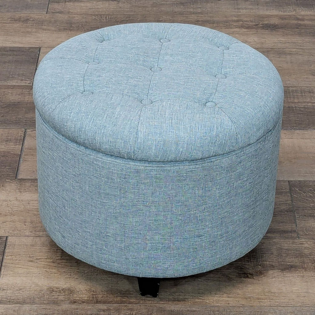 a black and white photo of a white and brown couch 