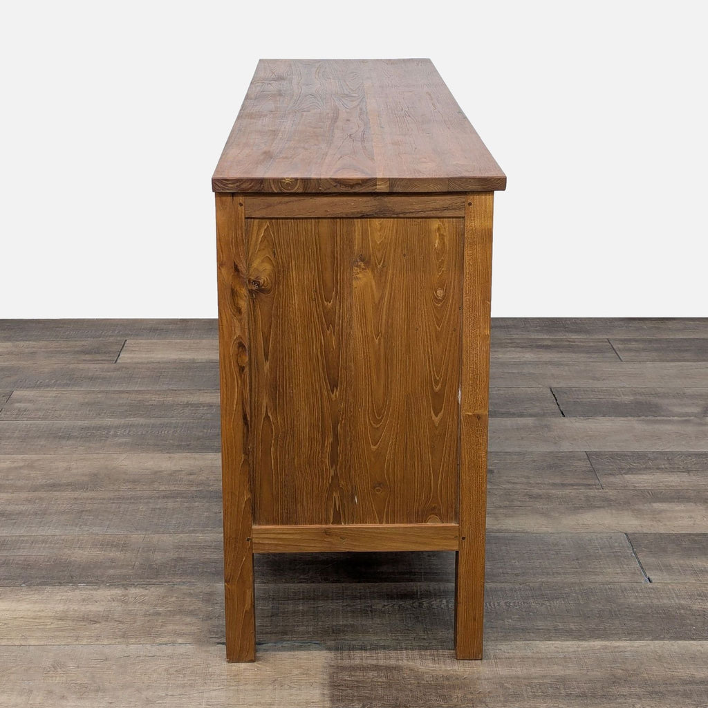a wooden table with a wooden cabinet on top of it 