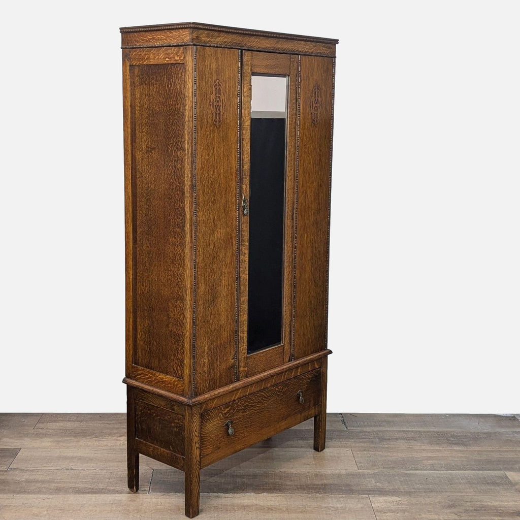 a wooden cabinet with a wooden handle on the floor 