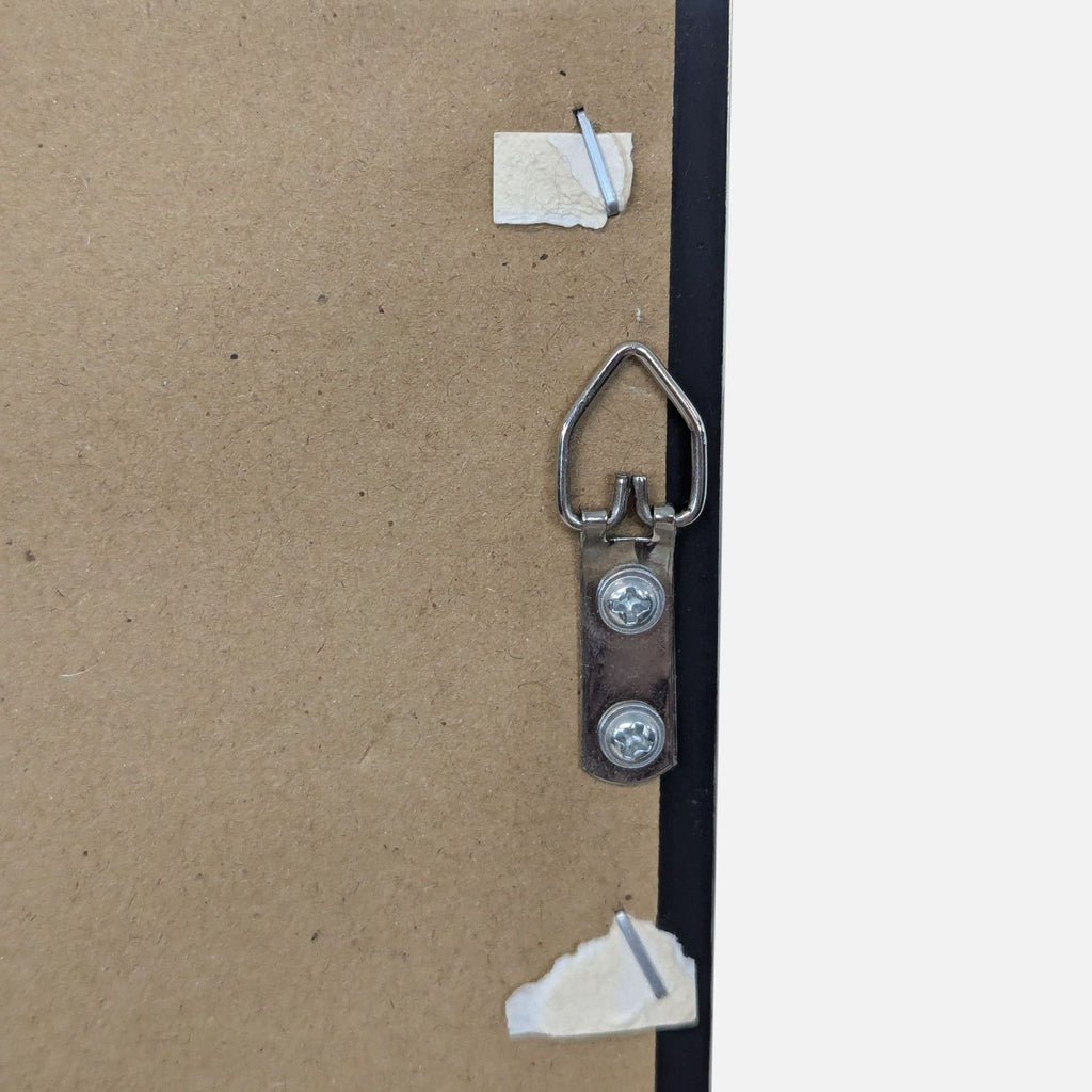 a pair of shoes on a floor with a paper towel 