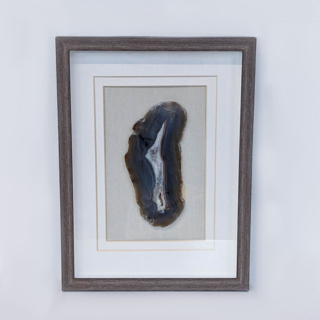 a picture of a person with a shoe on a wall 