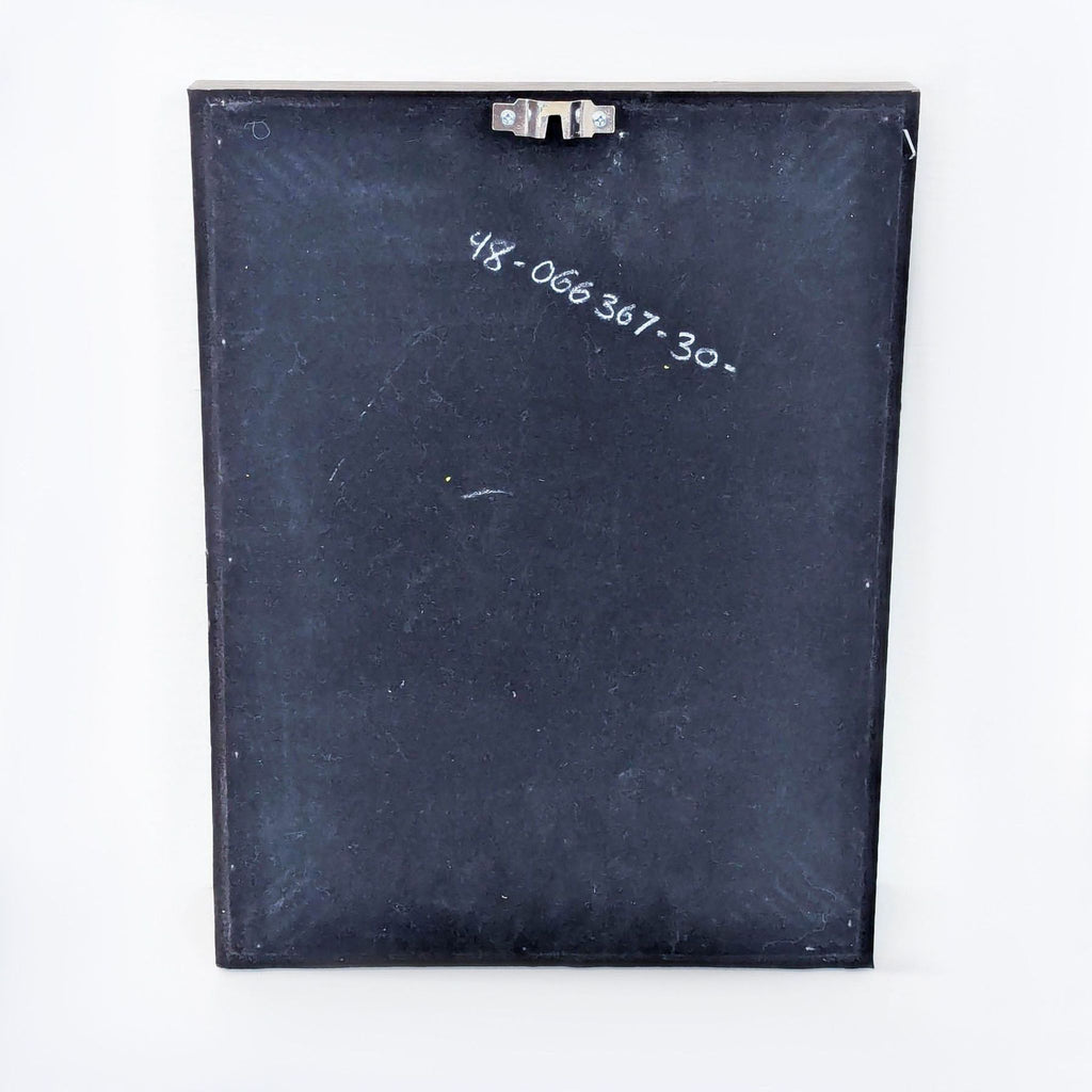 a black and white photo of a wooden table 