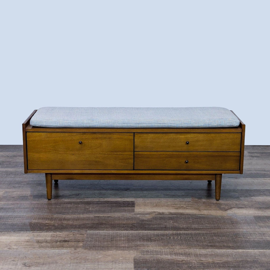 a bed with a wooden headboard and a wooden floor 