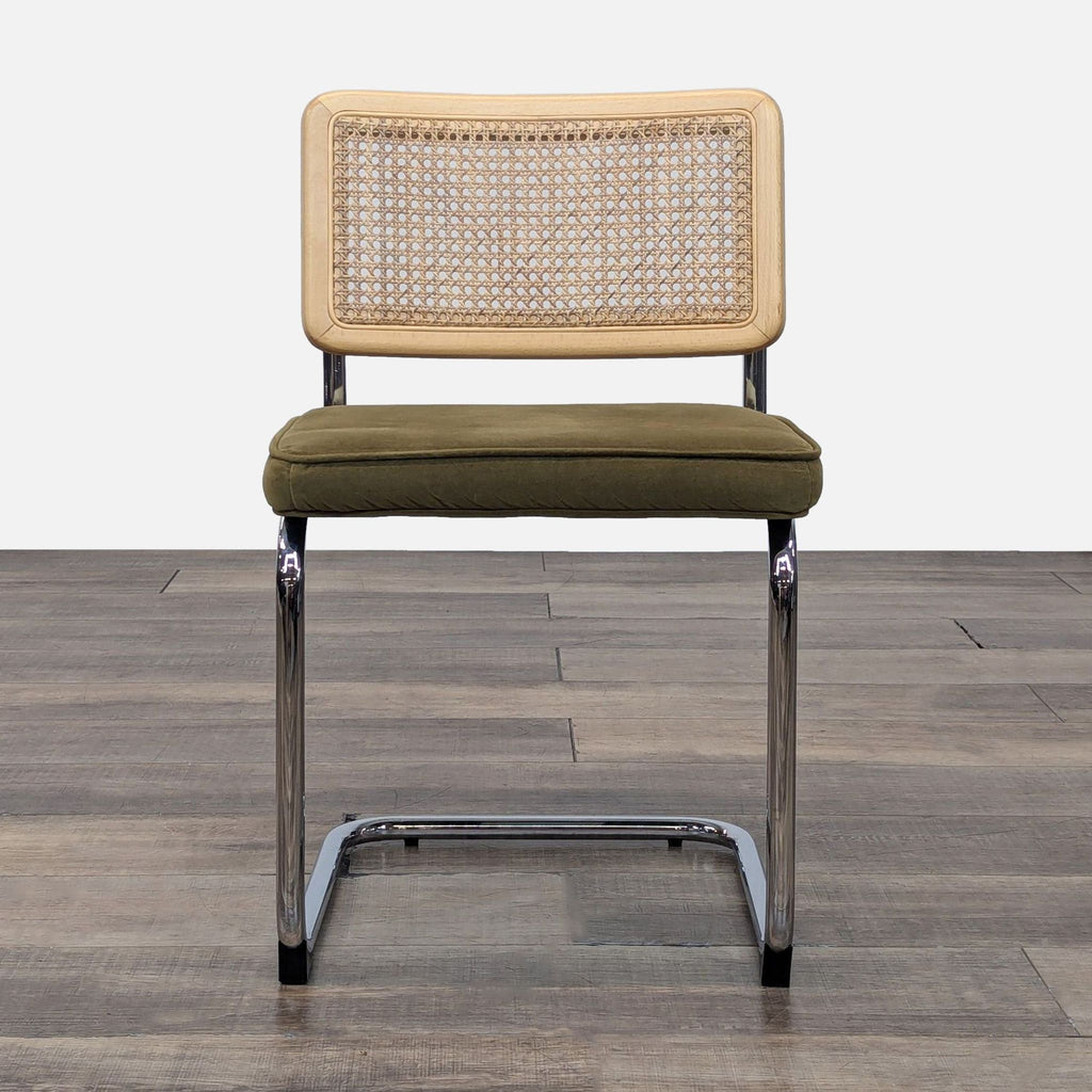 a chair with a wooden frame on a floor 