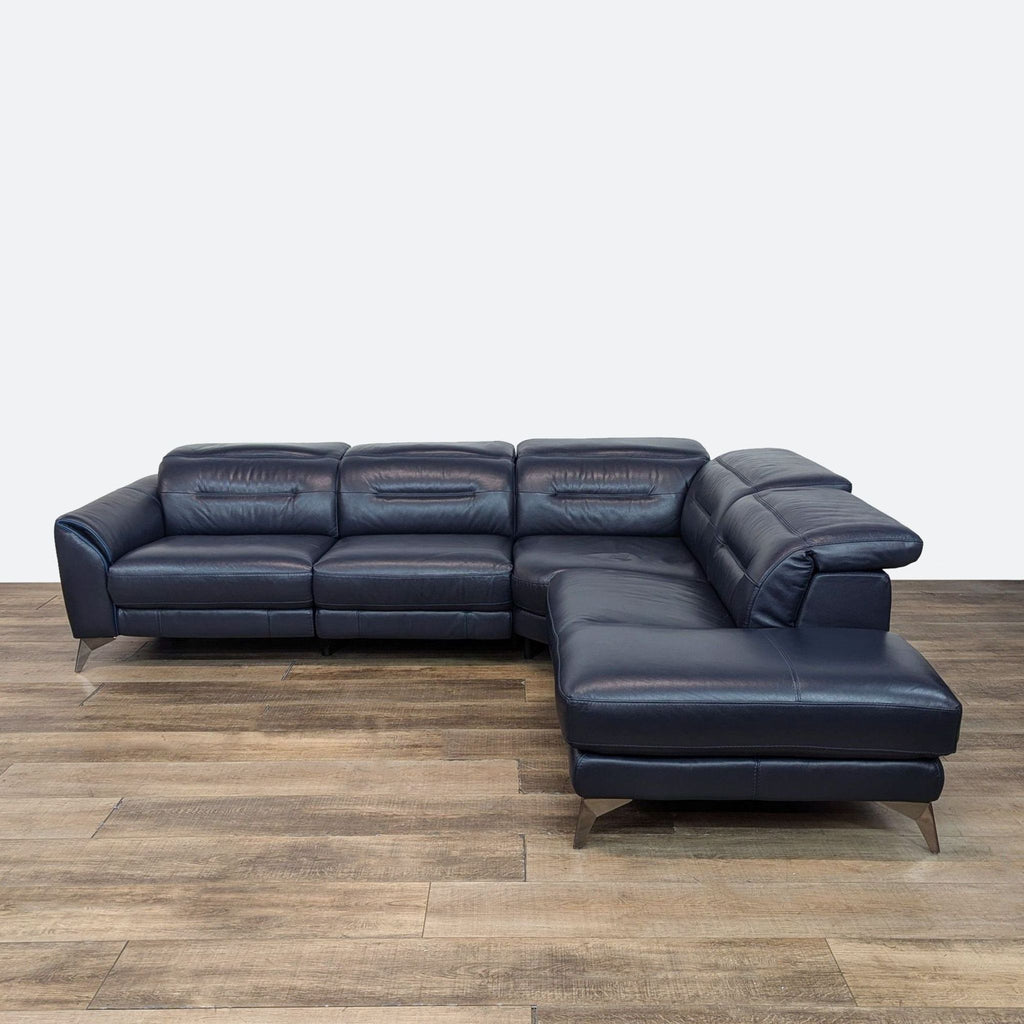 1. Reperch navy leather sectional sofa with power recliners and adjustable headrests, shown on wood flooring.