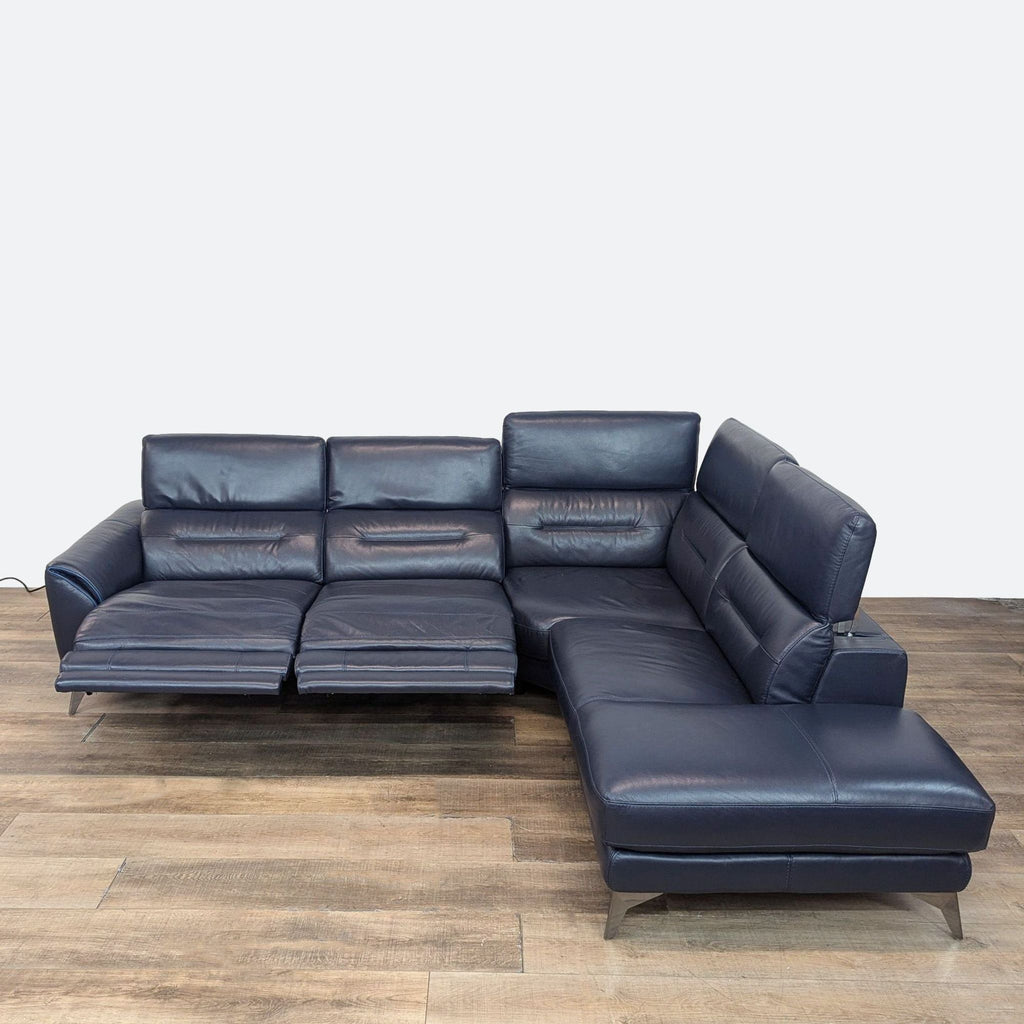 2. Navy Reperch sectional sofa with reclined seats and elevated headrests, featuring stainless steel feet.