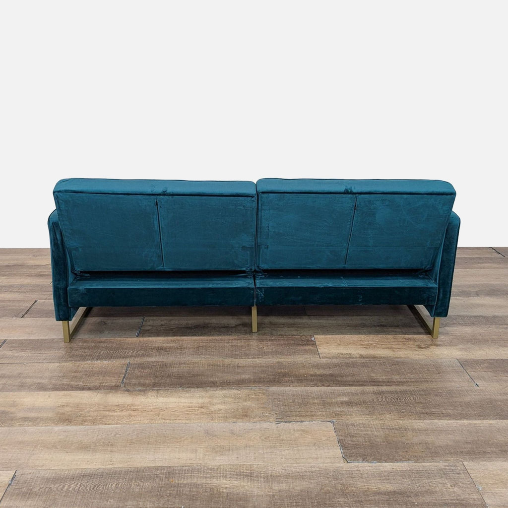 a couch with a blue couch cushion on it 