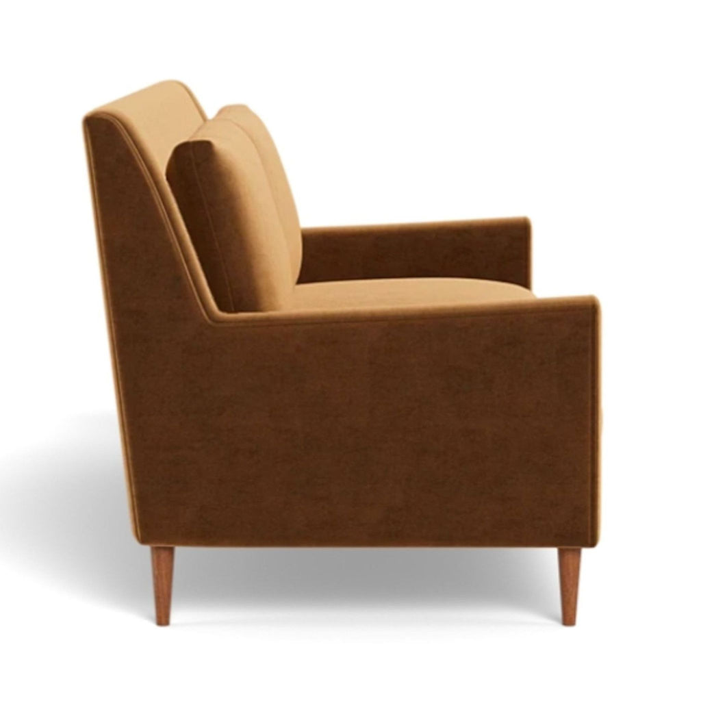 a white chair with a black seat cushion 