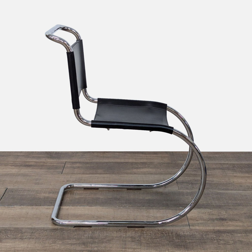 a chair with a wooden handle on it 