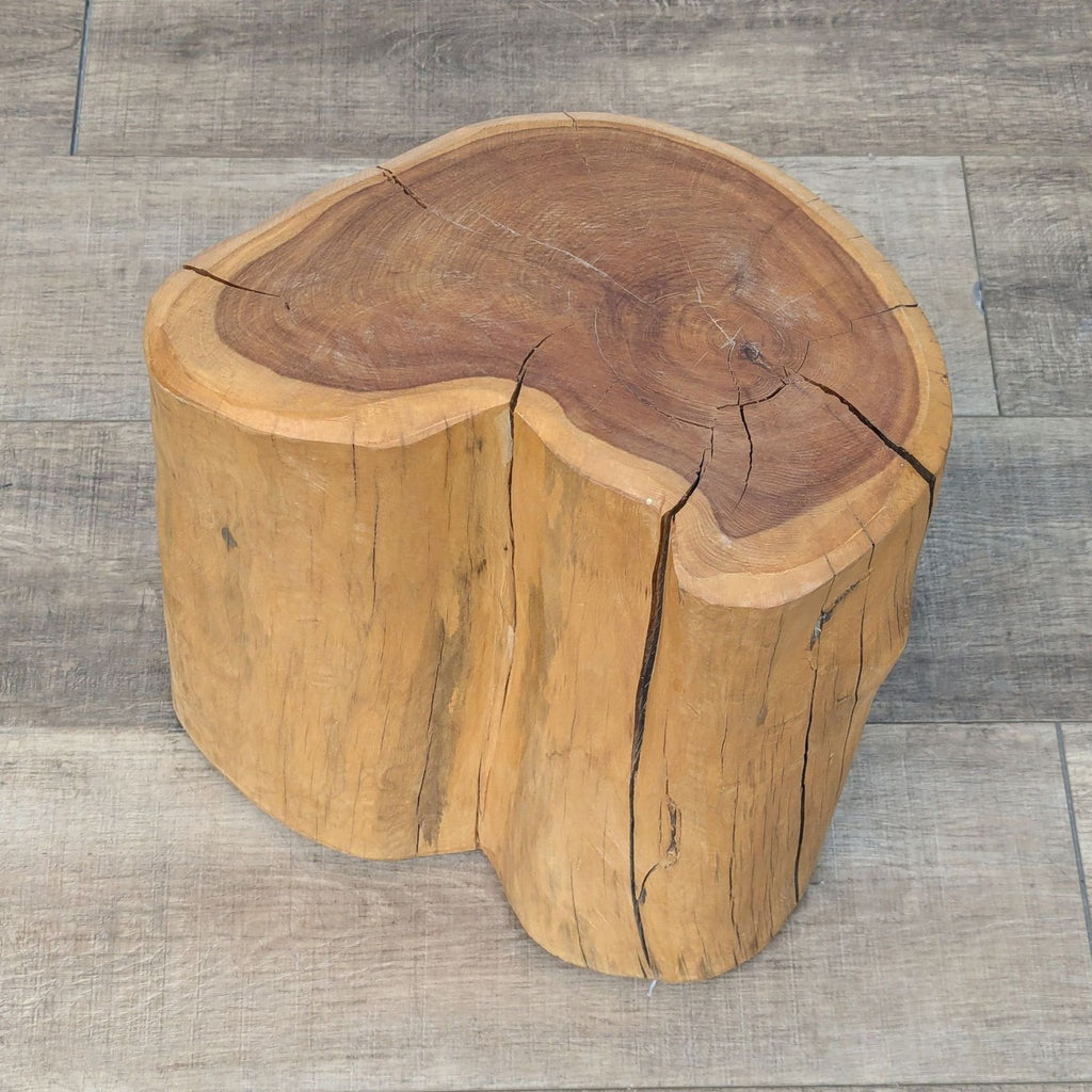 a wooden bench with a wooden handle on it 