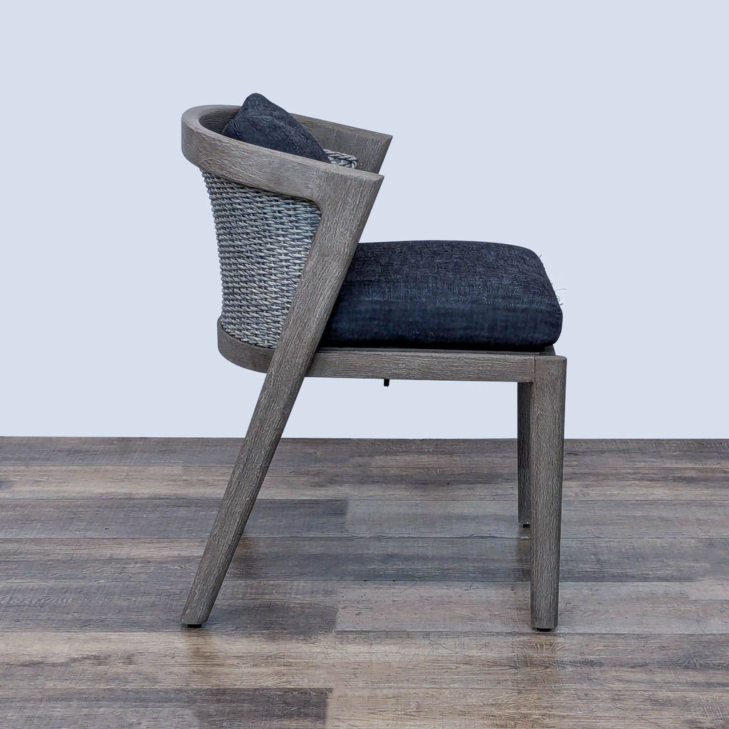Restoration Hardware Malta chair featuring architectural teak, wicker back, and all-weather quick-dry cushions.