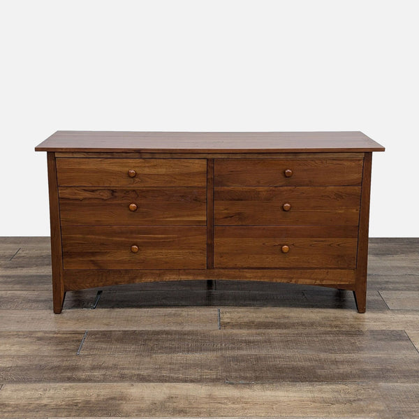 a wooden cabinet with a wooden head board 