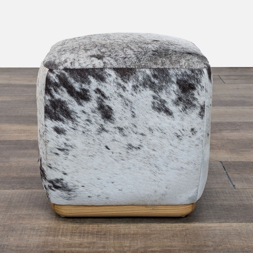 a piece of wood with a small piece of cloth on it 