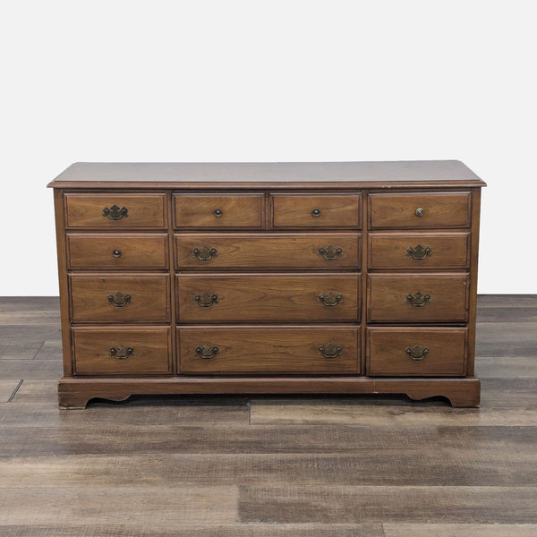 a wooden dresser with a wooden headboard 