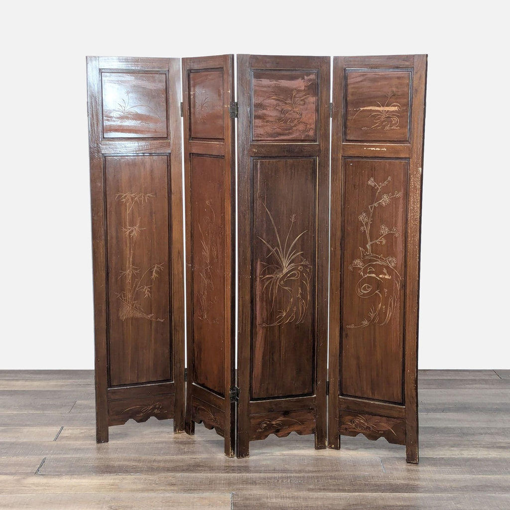 2. Backside of a four-panel wood screen with subtle engraved botanical patterns and a smooth brown finish.