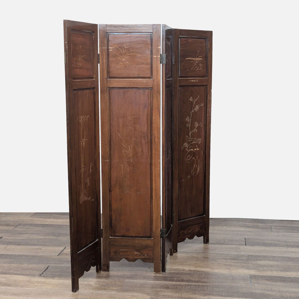 3. Side view of a wooden folding screen with artistic floral engravings, designed by Reperch.