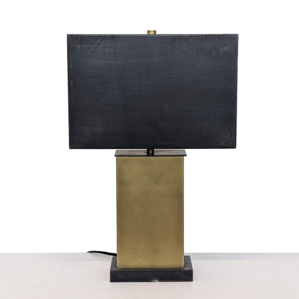 a black and white photo of a white clock 